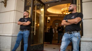 bouncers at the entrance of a sex club